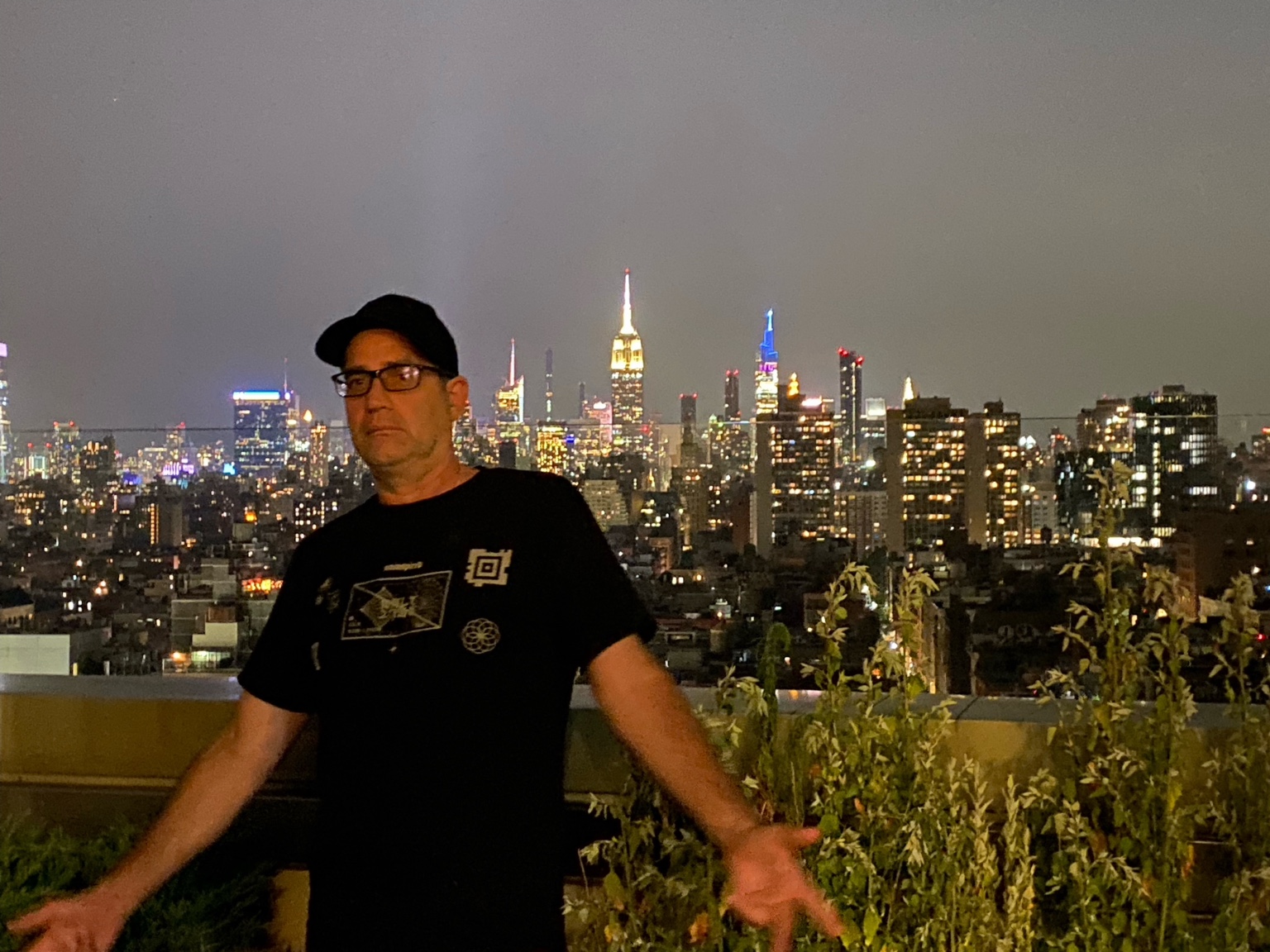 Kenny Scan above the New York City skyline